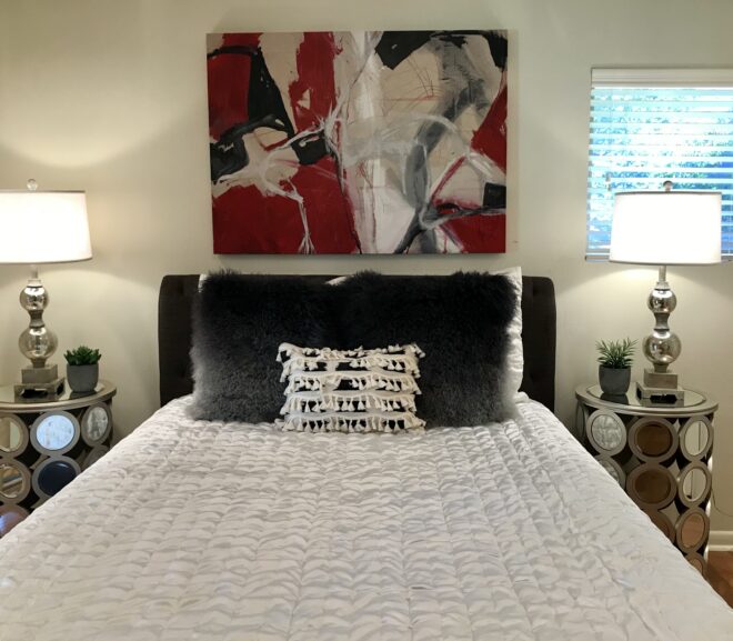 bedroom interior with art on wall