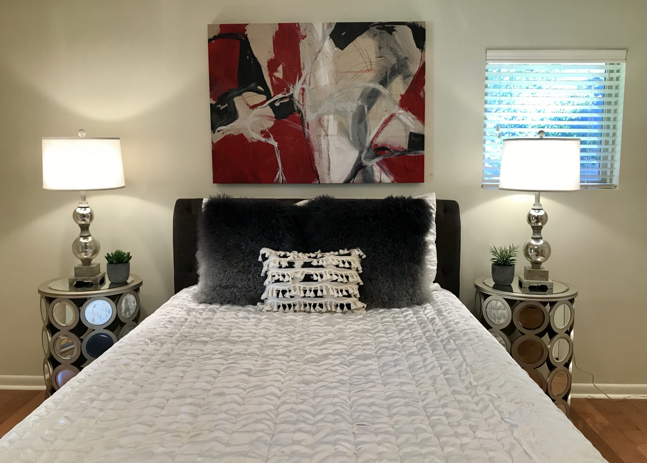 bedroom interior with art on wall