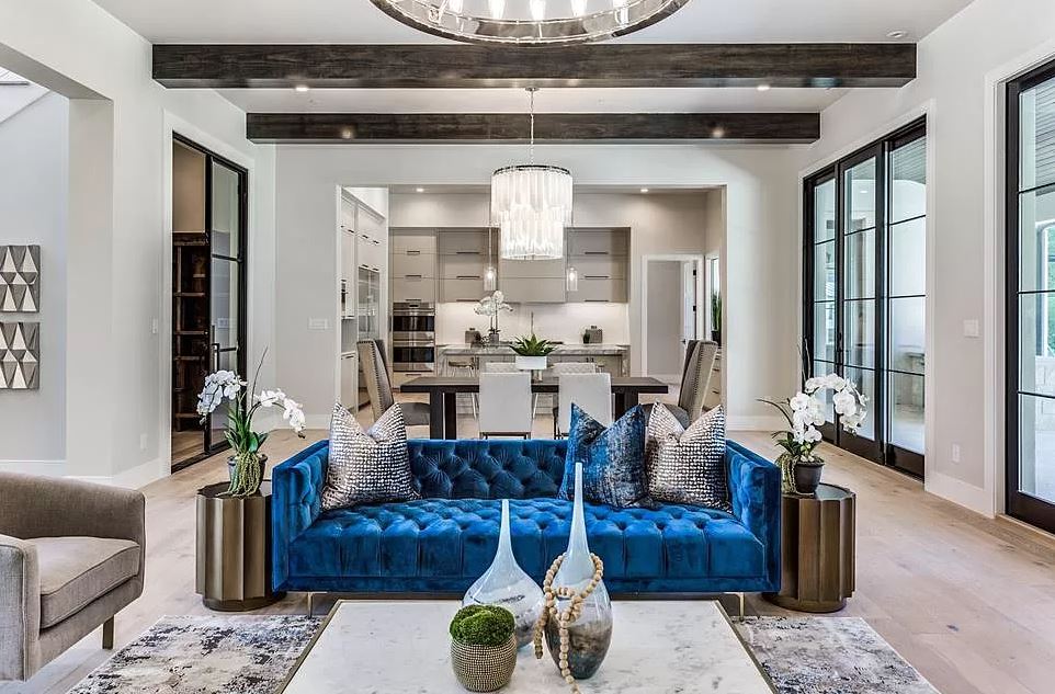 living room interior with blue sofa