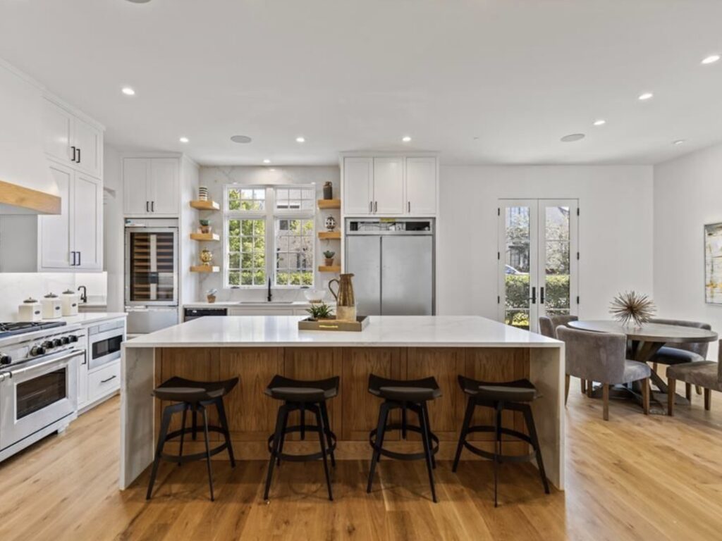 Kitchen staged with barstools and accessories
