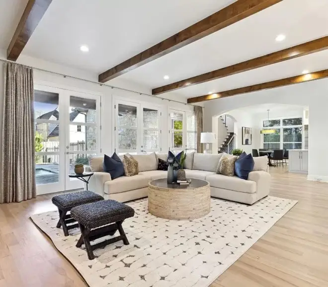 Home Staging in Dallas Fort Worth with L-shape sofa, ottoman and benches