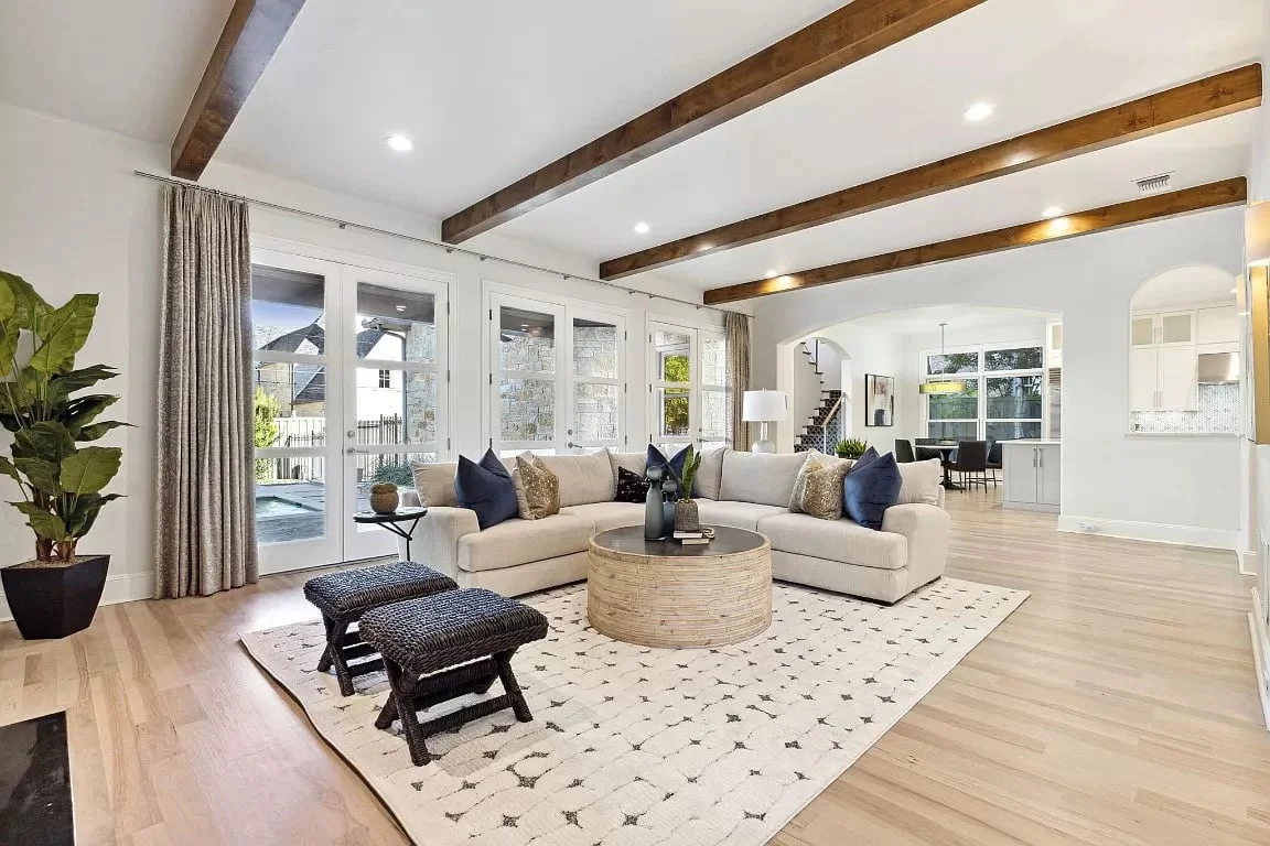 Home Staging in Dallas Fort Worth with L-shape sofa, ottoman and benches