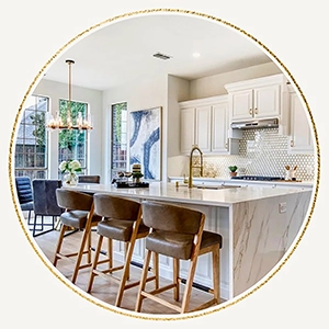 Kitchen staged with modern leather and light wood barstools, large abstract artwork and kitchen accessories